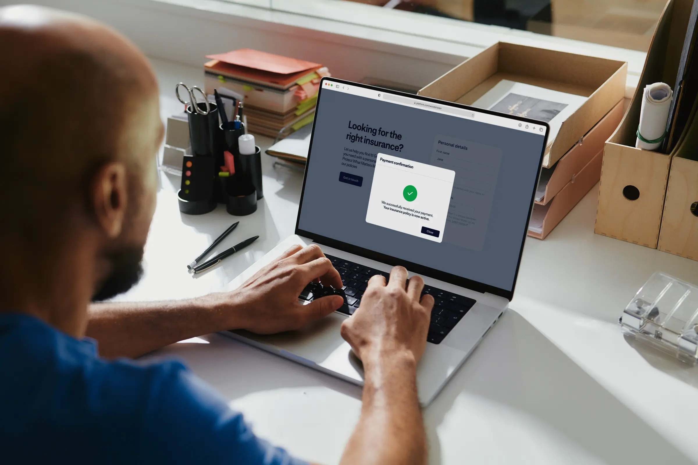 Person interacting with insurance focused UI on their device