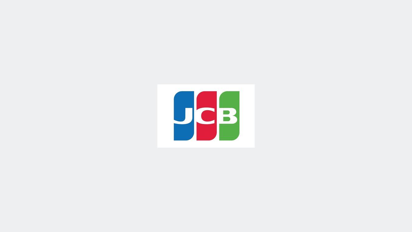 Adyen logo with three colorful blocks representing JCB, in a neutral business context.