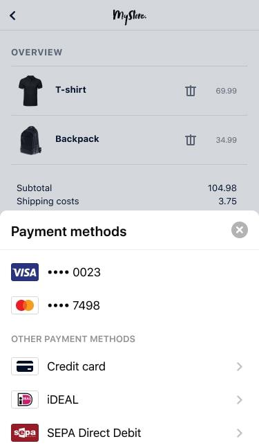Mobile shopping cart screen with items, costs, and Adyen payment method options, including Visa and Mastercard.