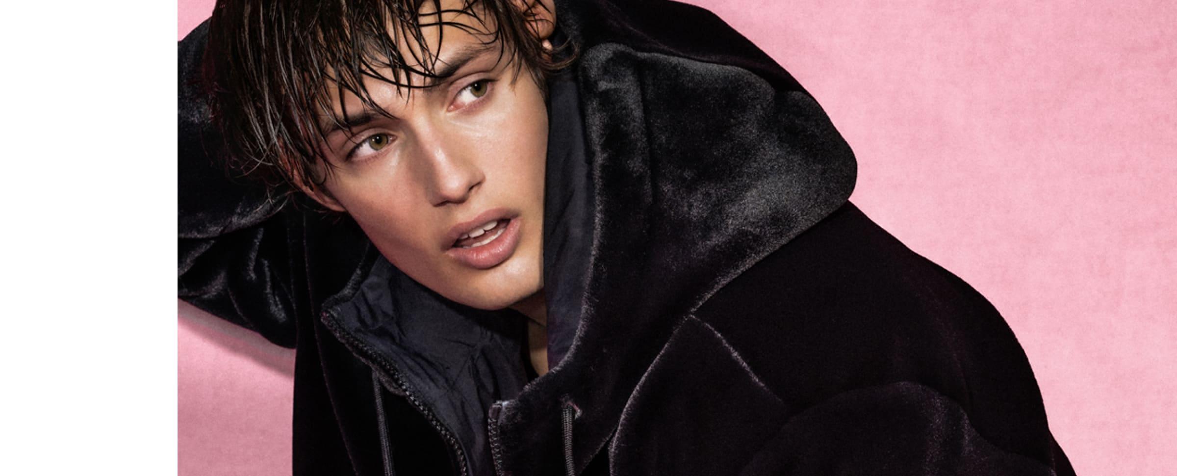 Male model on a pink background