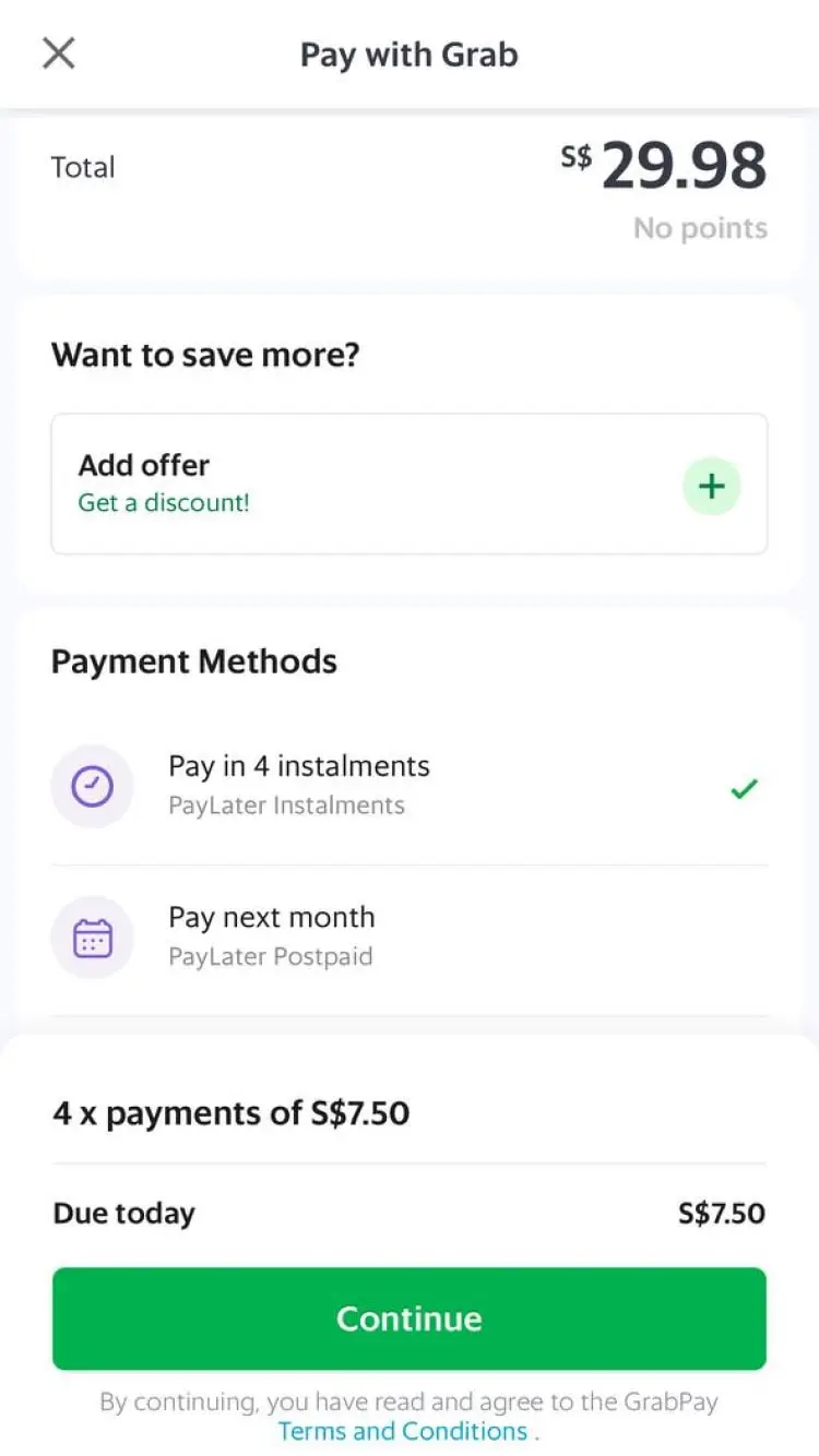 Mobile payment screen showing a total of $29.98 and options for installment payments.
