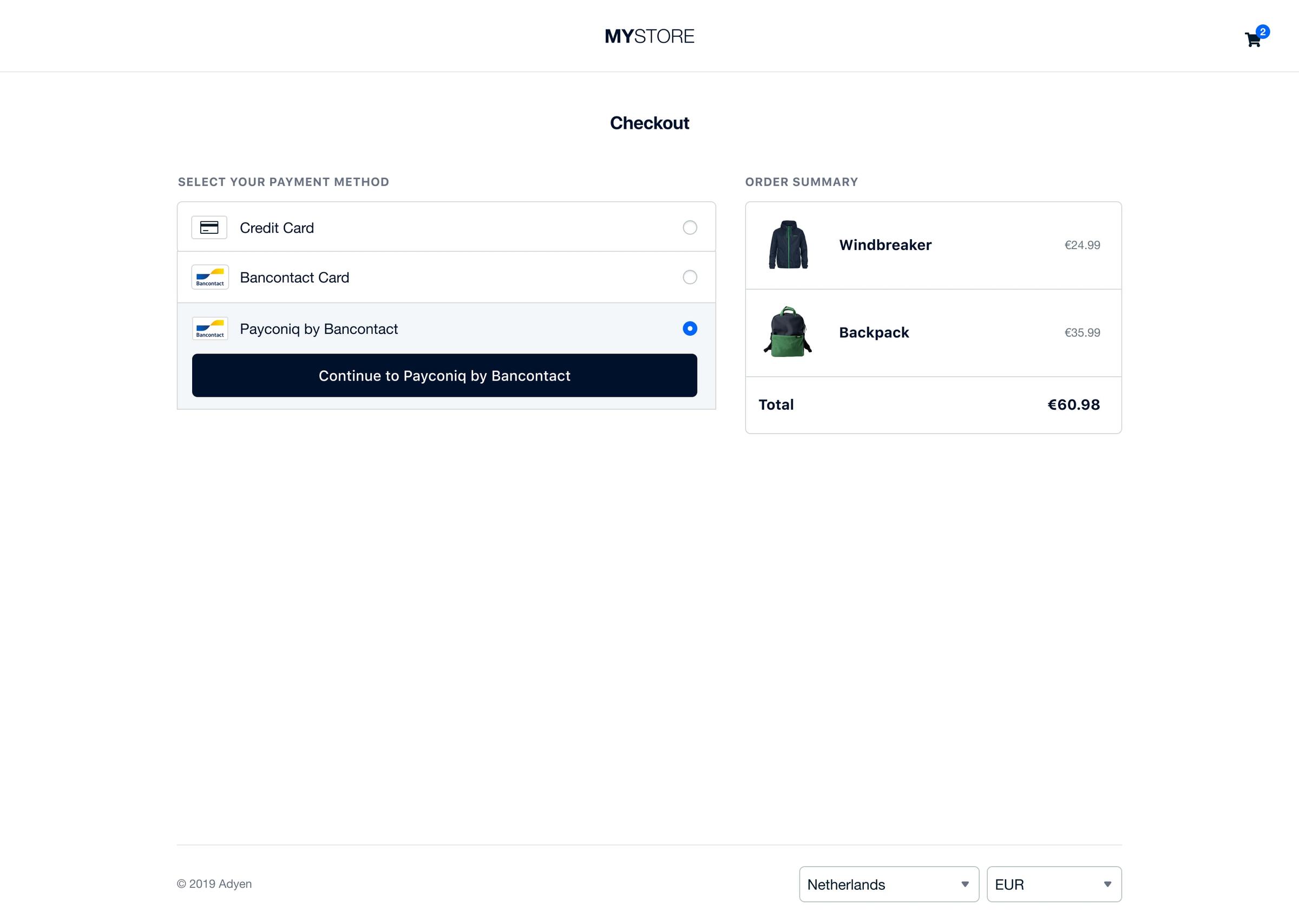 Adyen checkout page with payment options and order summary featuring a windbreaker and backpack.