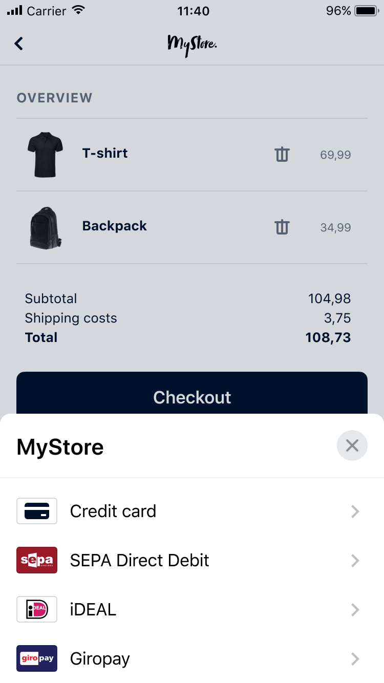 Schermo mobile che mostra una pagina di checkout con una maglietta, uno zaino e vari metodi di pagamento tra cui carta di credito e iDEAL.