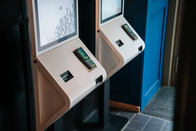 Adyen payment terminals positioned in self-checkout kiosks at Coffee Fellows.