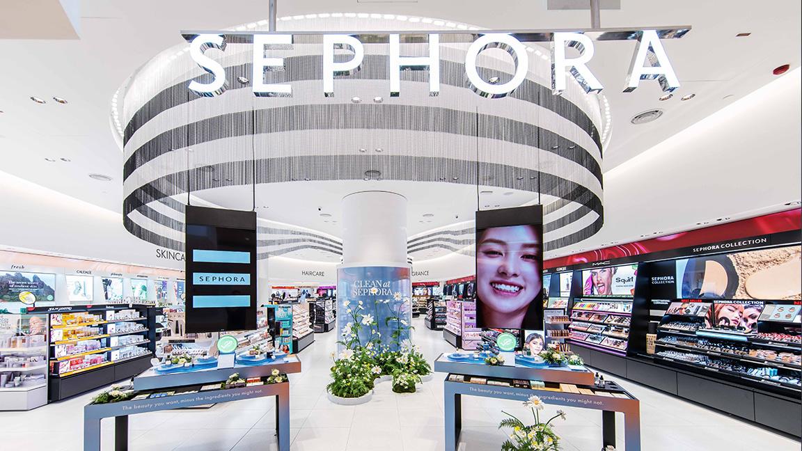 Interior of a Sephora store showcasing cosmetic products and displays with branding.
