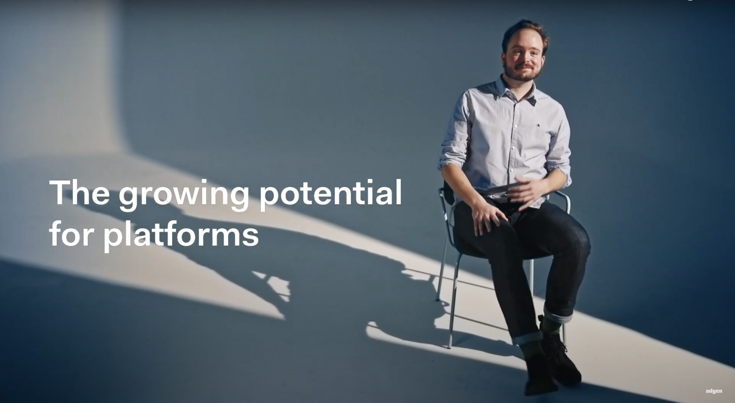 Hemmo, SVP, Platforms and Financial Services, sitting in front of the camera.