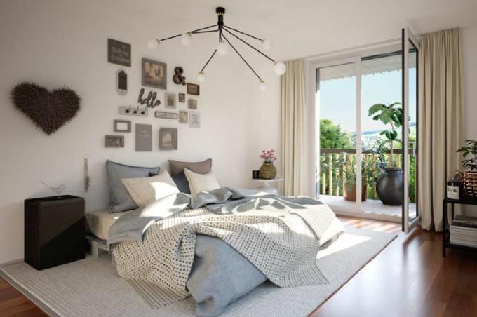 Schlafzimmer mit Bett und Balkon am Hohlenweg in Oeschgen