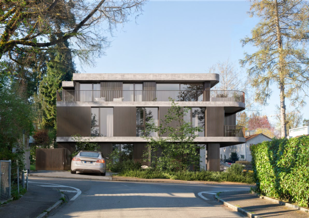 Moderne zweistöckige Gebäudefassade mit Parkplatz und grüner Umgebung in Basel-Landschaft