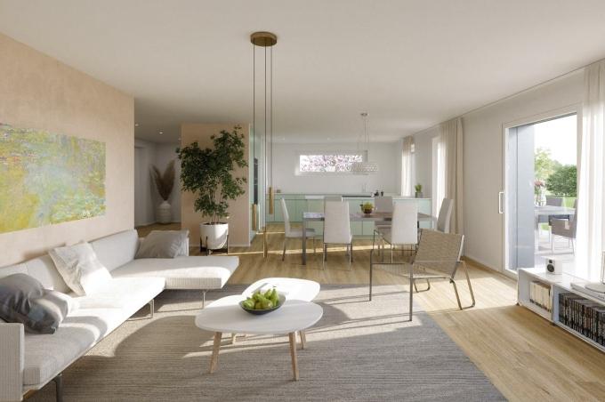 Wohnzimmer mit Esstisch, Stühlen, Sofa, Küche und Terrasse am Ischlagweg in Gelterkinden