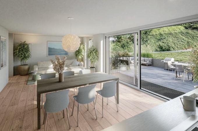 Wohnzimmer mit Esstisch, Stühlen, Sofa und Terrasse an der Dorfstrasse in Hersberg