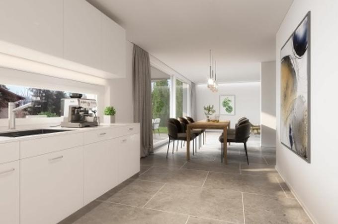 Wohnzimmer mit Esstisch, Balkon, Stühlen und Küche an der Hinterfeldstrasse in Laufen