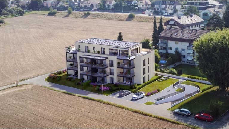 Moderne vierstöckige Wohnanlage in ruhiger Umgebung mit Garten und Parkplätzen