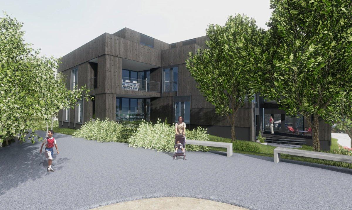 Mehrfamilienhaus mit Eigentumswohnungen in dunkelbrauner Holzfassade mit Sitzbänken am Hohlweg im Rebgarten in Oberwil