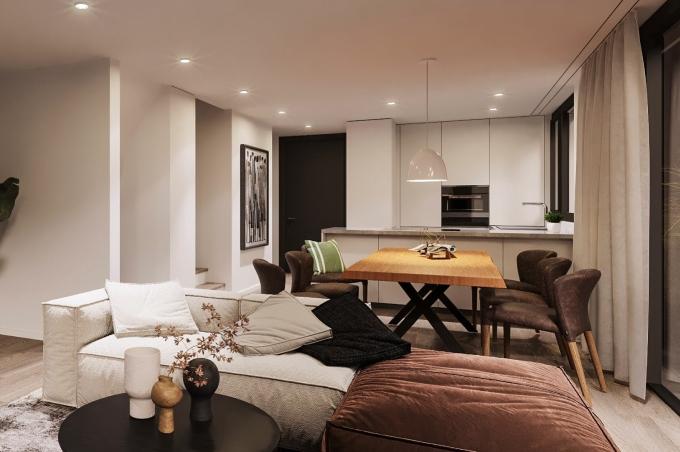 Wohnzimmer mit Sofa, Esstisch, Stühle und Küche an der Hardstrasse in Münchenstein