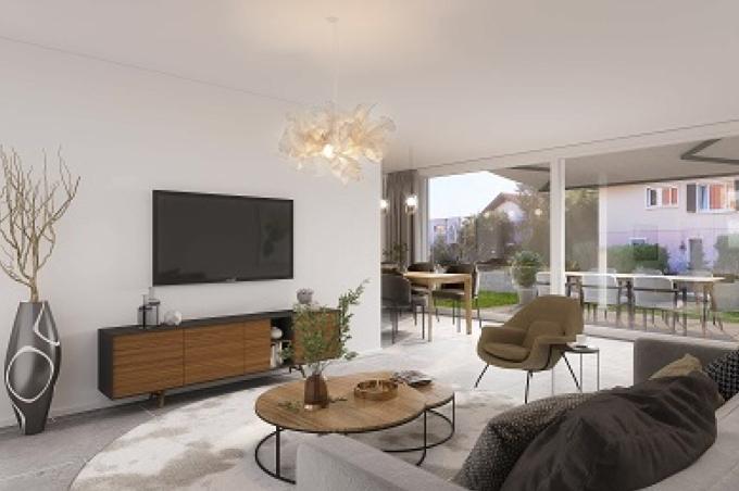 Wohnzimmer mit Fernseher, Balkon, Stühlen und Sofa an der Hinterfeldstrasse in Laufen