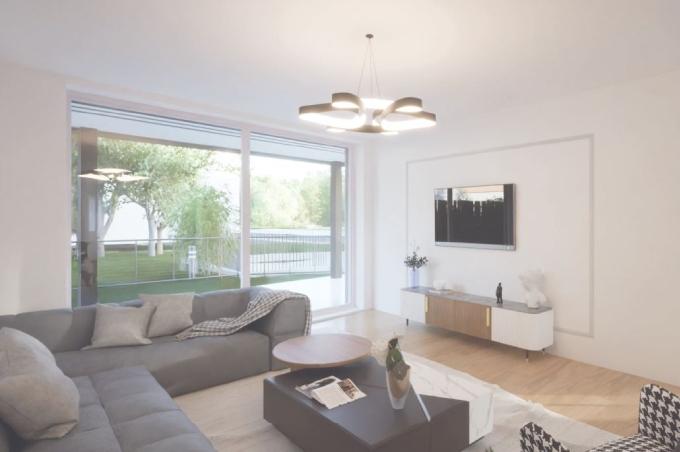 Wohnzimmer mit Sofa, Terrasse und Fernseher am Bruggmattweg in Laufen