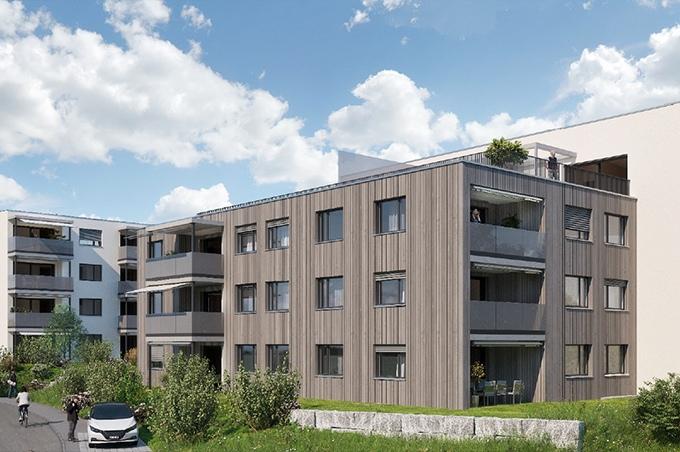 Mehrfamilienhaus mit brauner Fassadenfarbe am Burkhaldenpark in Herznach