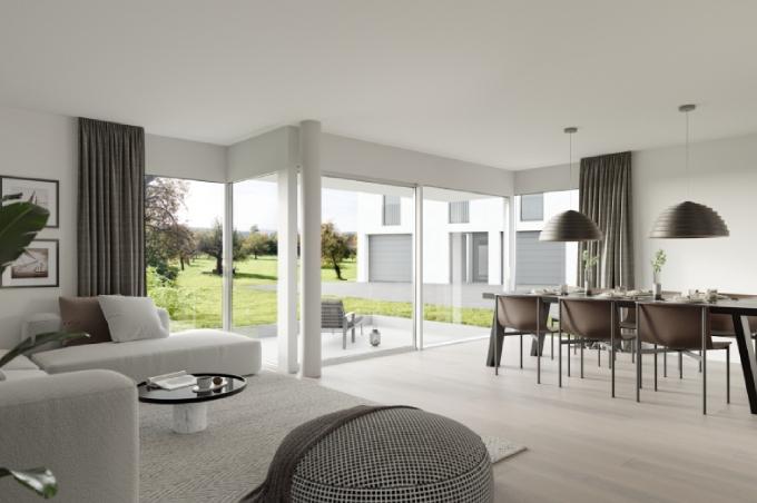 Wohnzimmer mit Esstisch, Stühlen und Balkon an der Dorfstrasse in Zwingen