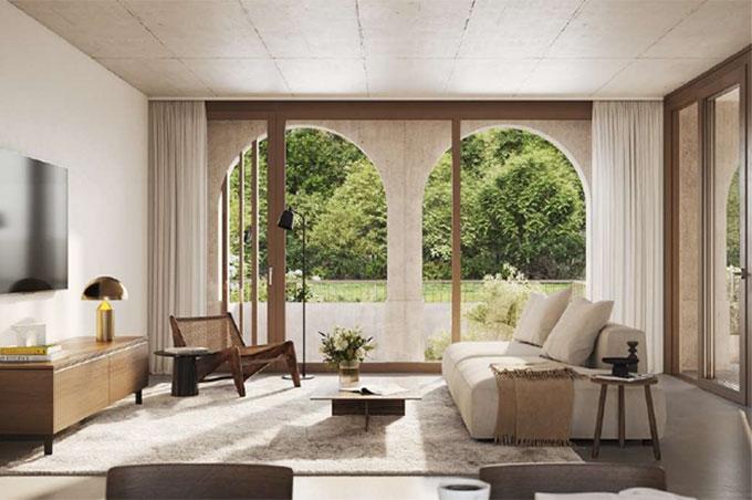 Wohnzimmer mit Sofa, Fernseher und Balkon am Eichenweg in Muttenz