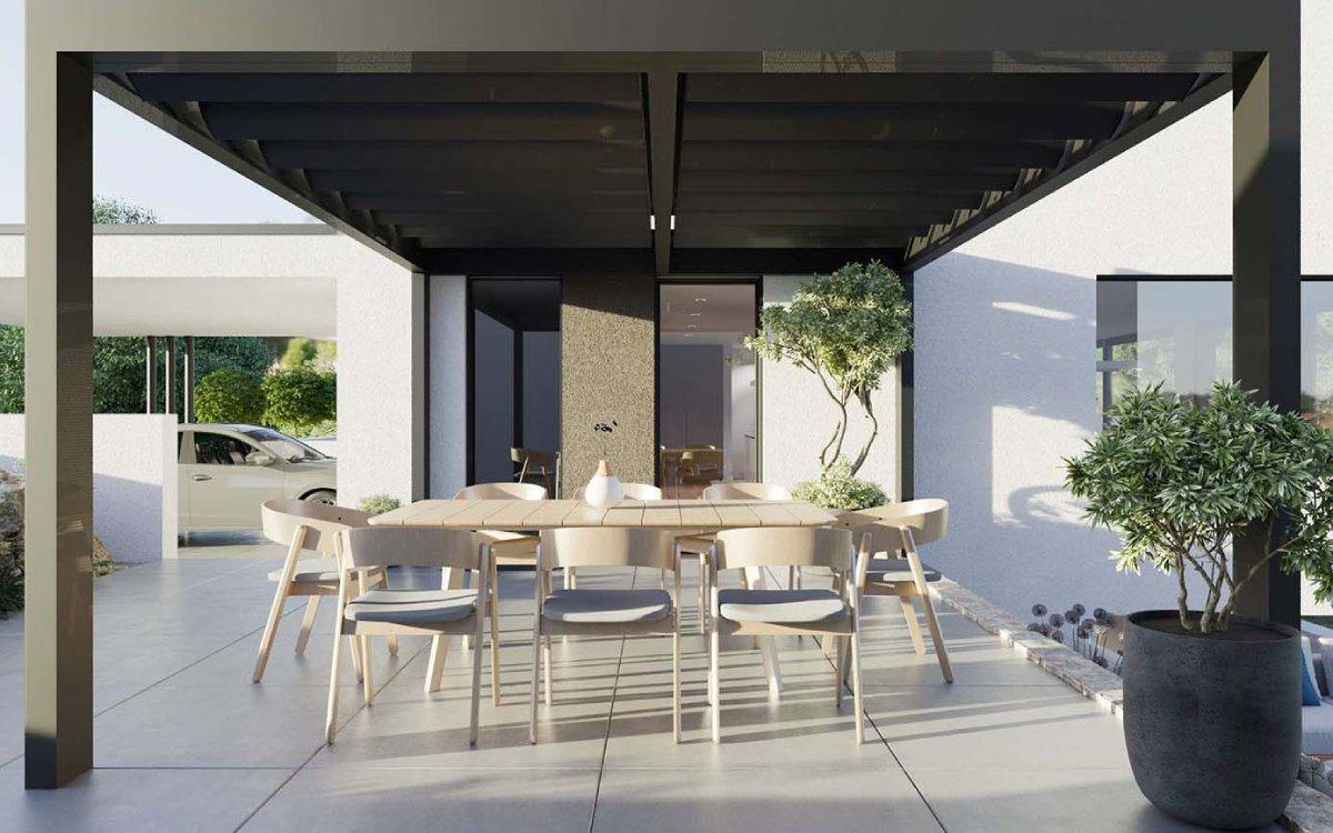Terrasse mit Esstisch und Stühlen an der Gartenstrasse in Lupsigen