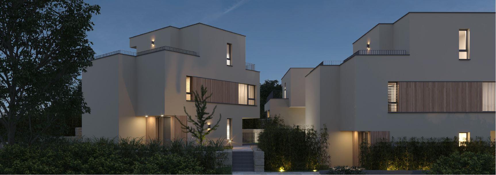 Moderne weiße Gebäude bei Dämmerung mit Garten und Beleuchtung