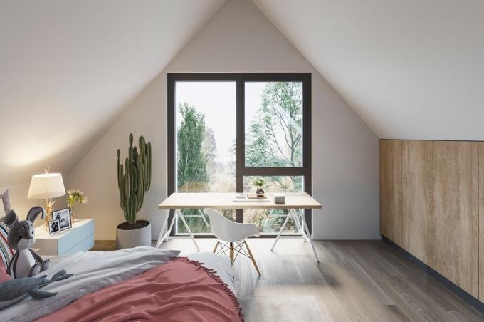 Schlafzimmer mit Bett, Stuhl, Schreibtisch und Fenster an der Hardstrasse in Münchenstein
