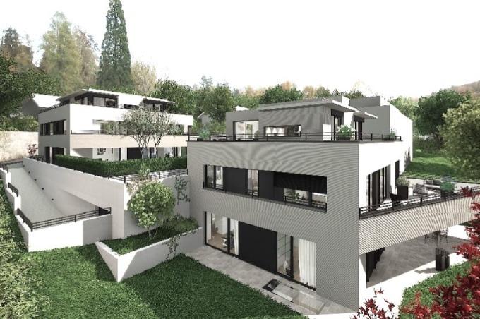 Terrassenhäuser mit Eigentumswohnungen von hinten an der Wechselmattstrasse in Bottmingen