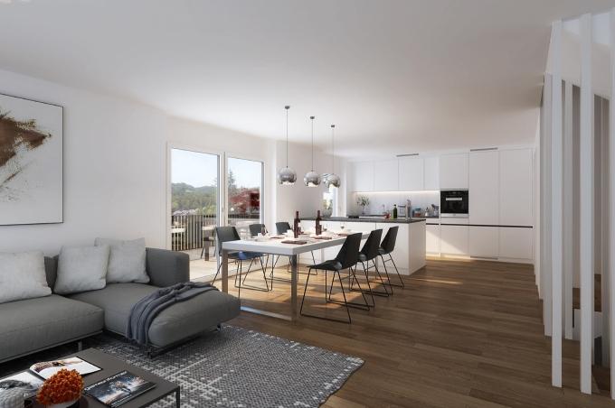 Wohnzimmer mit Esstisch, Stühlen und Balkon am Räckholder in Trimbach