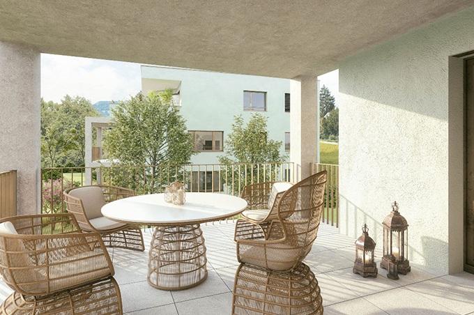 Balkon mit Tisch und Stühlen an der Loogstrasse in Münchenstein