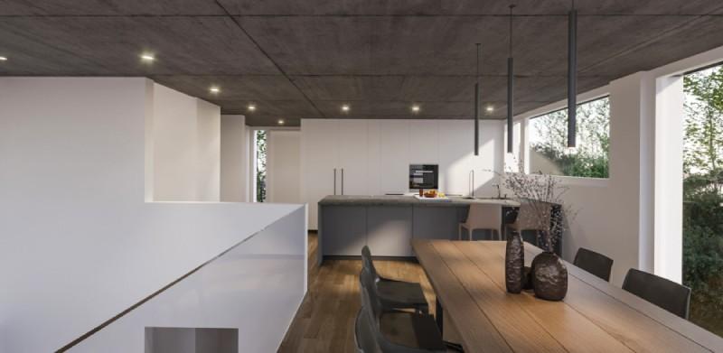 Moderne Küche mit Esstisch und großen Fenstern der Einfamilienhäuser am Baselweg in Hochwald.