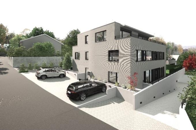 Terrassenhäuser mit Eigentumswohnungen und Parkplätzen an der Wechselmattstrasse in Bottmingen