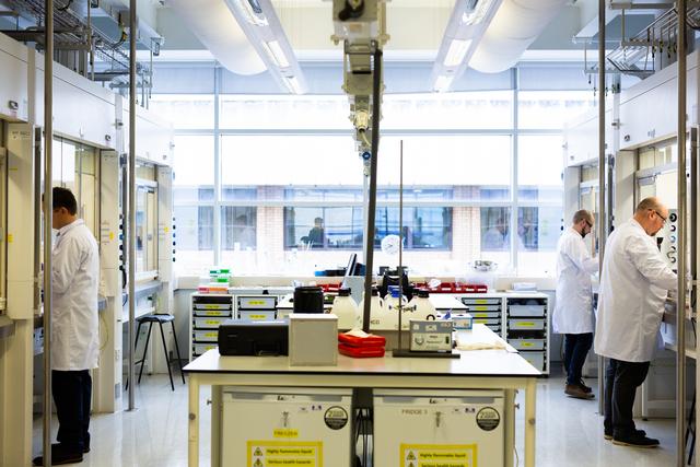 People working in wet lab space
