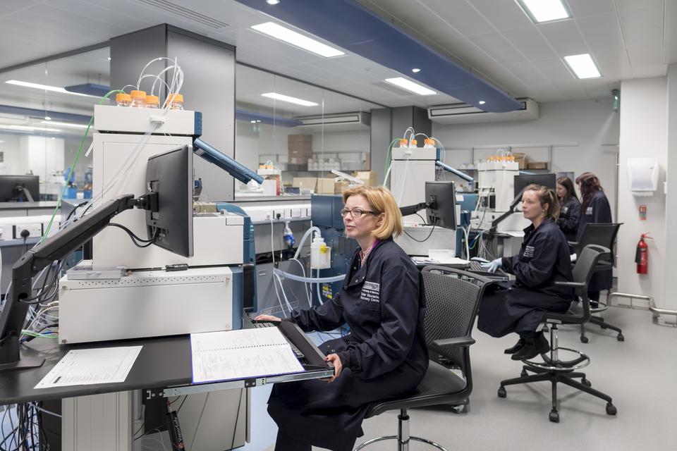 People working in dry lab space