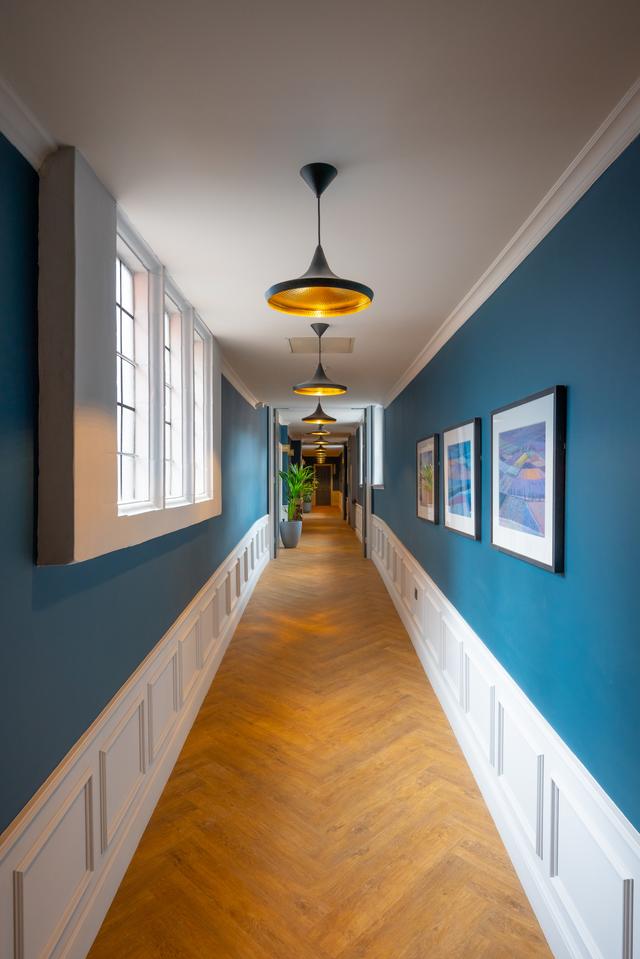 Walking down the corridor at Cornwall Buildings
