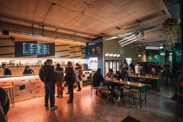 People enjoying a drink at North Taproom Circle Square