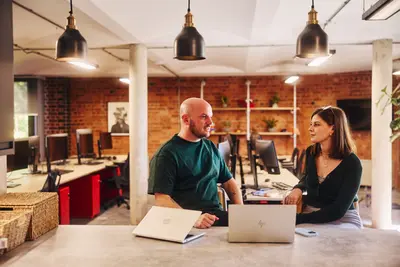 Office space with exposed brickwork at Wilderspool Park