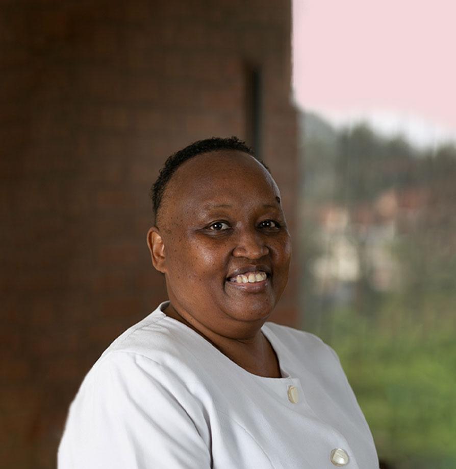 Anne K Waweru