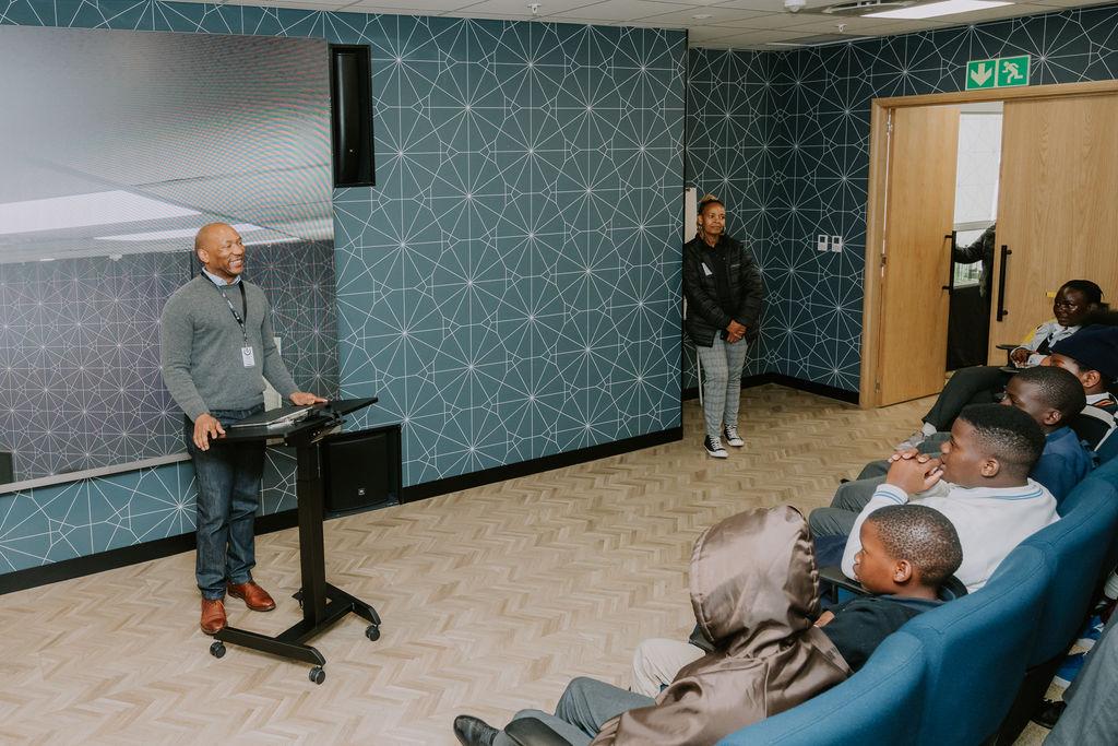 Duzi addressing students