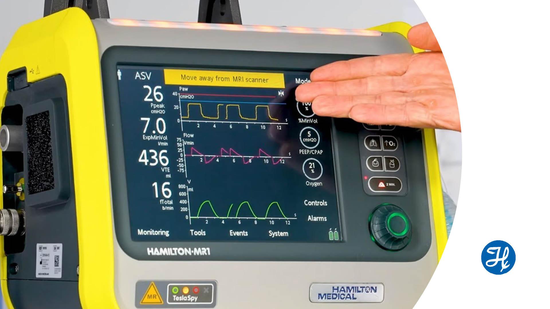With the new Software update 3.0 for the HAMILTON-MR1, the audiovisual TeslaSpy alarms on the are now mirrored on both the ventilator display and the alarm lamp for greater visibility. TeslaSpy is a magnetic field navigator which continuously measures the background magnetic levels, even when the ventilator is switched off. It lets you know when magnetic field levels are safe, and when they exceed the ventilator’s safety threshold. The TeslaSpy alarms are now also included in the Event log. The Software Update 3.0 brings a lot of new features to our compact devices. To learn more go to: www.hamilton-medical.com/compact-device-more-features The availability of SW v3.0.x, as well as individual features, depends on the specific device and market.