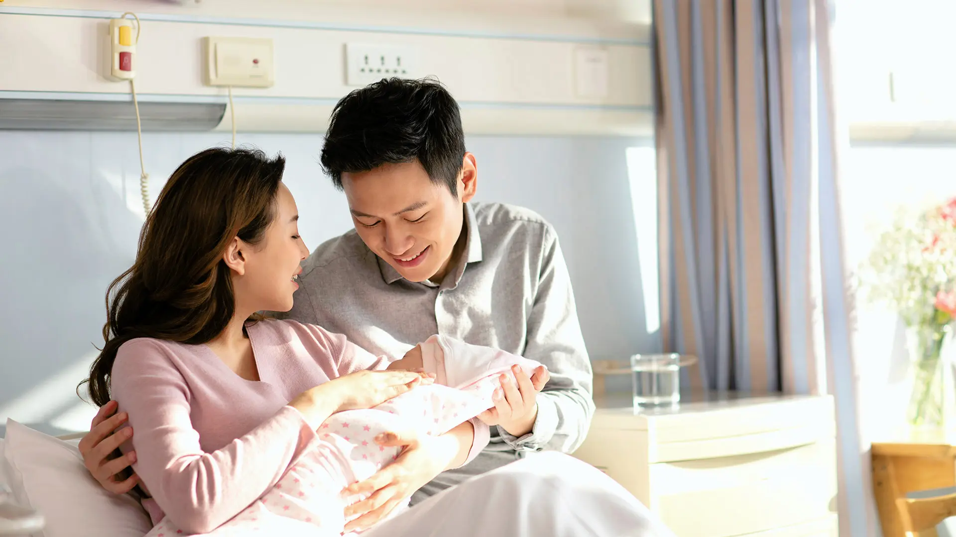 A happy couple welcoming their baby at Parkway East Hospital