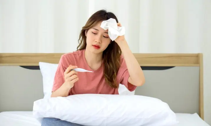 Woman with headache and fever