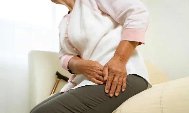 Elderly woman with hip pain