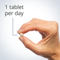 Hand holding Vitamin D3 2000 Complex tablet, indicating a recommended dosage of one tablet per day for bone and immune support.