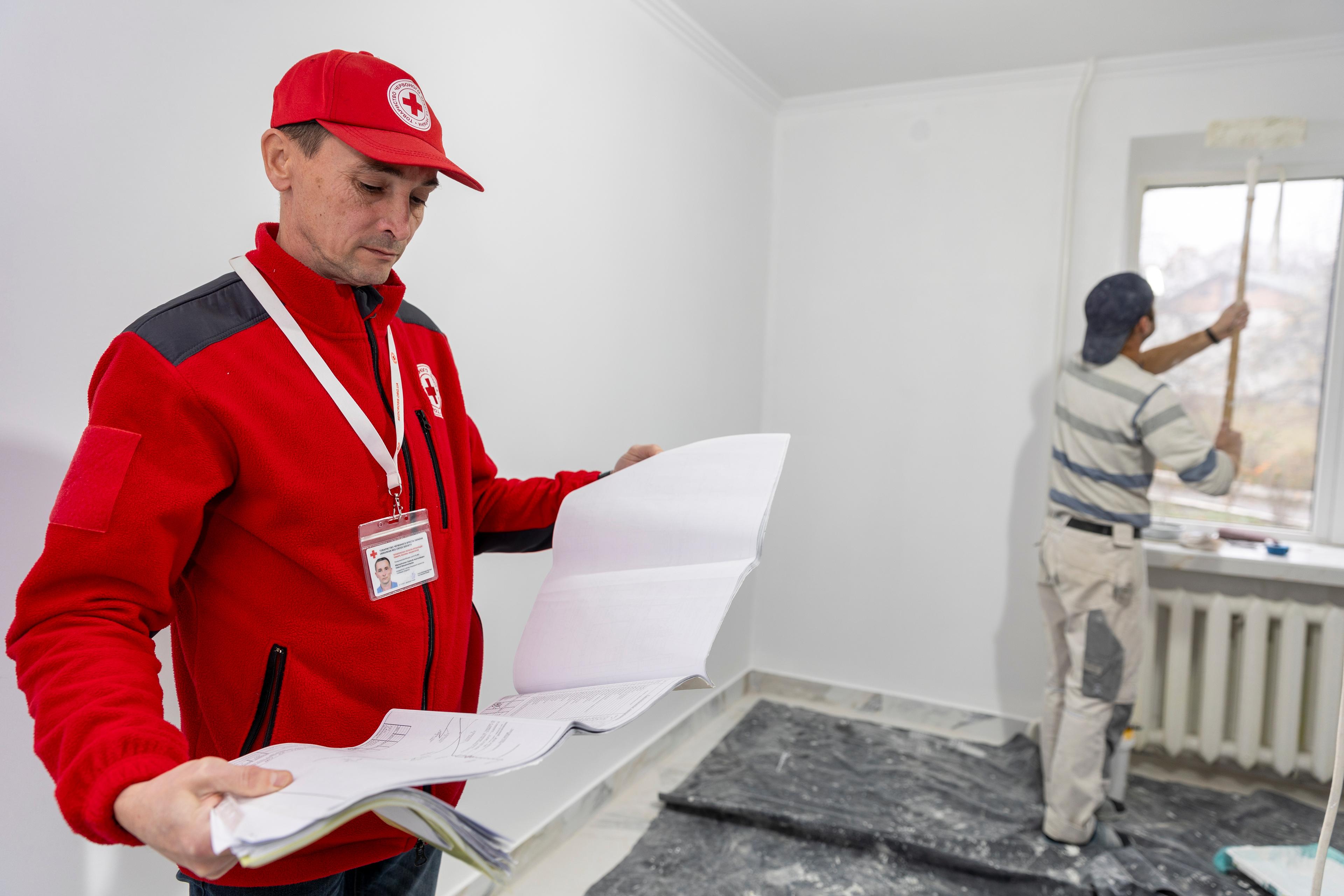 Oleksiy Mirochnichenko (engineer from the Ukrainian Red Cross) inspects the renovation of an elderly home in Petrykiv, Ternopil Oblast, Ukraine. This facility is one the four durable housing solutions supported by the SRC in Western Ukraine. 